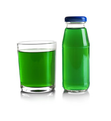 Bottle and glass with delicious juice on white background