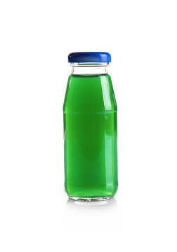 Delicious juice in bottle on white background