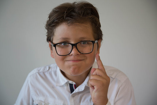 Portrait attractive smiling playful causacian boy  looking camera 
