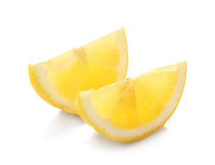 Slices of delicious lemon on white background