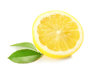 Half of delicious lemon and green leaves on white background