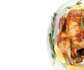 Plate with tasty homemade lemon chicken on white background