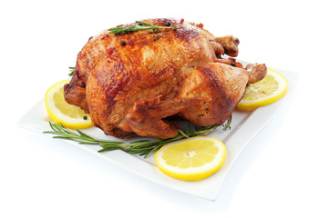 Plate with tasty homemade lemon chicken on white background