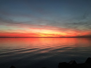 Fototapeta na wymiar Incredibly colorful sunset in Trieste Italy