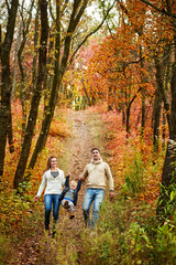 walking Family in autumn forest