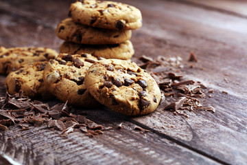 Chocolate cookies on wooden table. Chocolate chip cookies shot