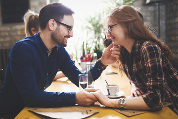 Couple eating out and dating in restaurant