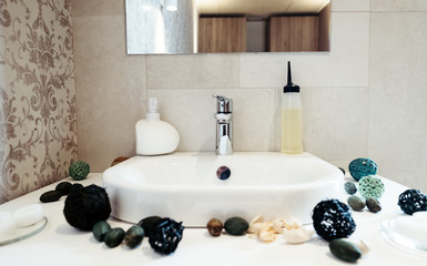 Decorated sink in bathroom and soap