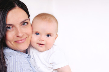 Little cute baby on mother's hand