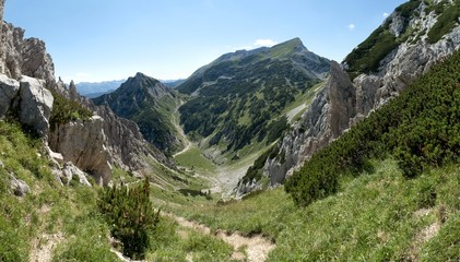 summit of Tosc mountain from hillside of Visevnik in Triglav national park in Julian Alps in Slovenia