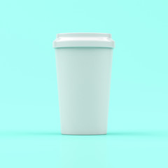 Blank white coffee cup on pastel blue background.