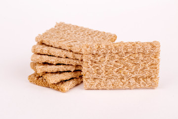 Group of healthy crispbreads on white background.
