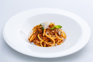 Pasta with tomato sauce and parmesan