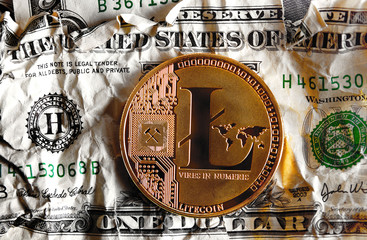 llitecoin on Crushed dollar banknote