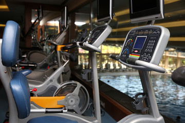 Modern fitness machines in gym