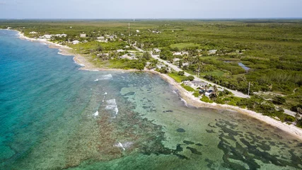 Photo sur Plexiglas Anti-reflet Plage de Seven Mile, Grand Cayman Aerial view of a coral lagoon and the northern coastline of Grand Cayman, Caribbean