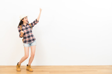 happy woman making a gesture of victory winner