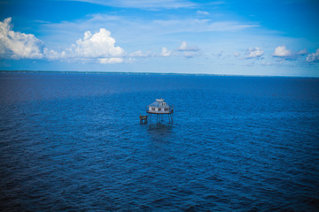 solitary house on the open seas