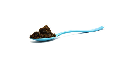 Organic coconut palm sugar in measuring spoons
