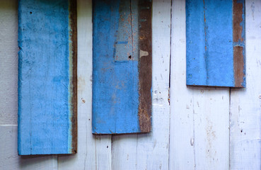 Old blue wood panels and white background for the background.