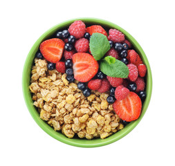 Muesli with fresh berries in a bowl isolated on white background.