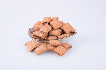 cookie or biscuits filled with chocolate cream on a background.