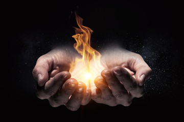 Fire burning in his hands