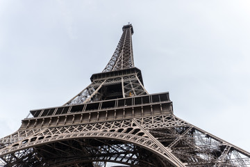 Fototapeta na wymiar Paris, France - April 29, 2016: Eiffel Tower. Constructed from 1887–89 as the entrance to the 1889 World's Fair, it is a wrought iron lattice tower on the Champ de Mars in Paris