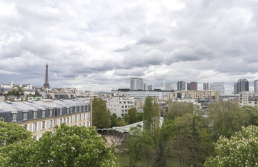 Fototapeta na wymiar Paris, France - April 29, 2016: Panoramic view of the cityscape with the Eiffel tower