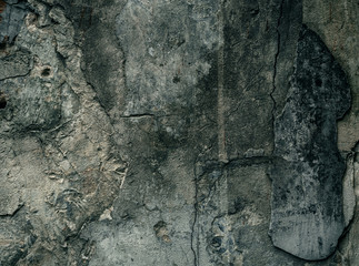 Old stone wall background, brick wall grunge texture close up.