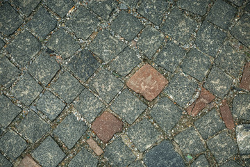 Old stone wall background, brick wall grunge texture close up.