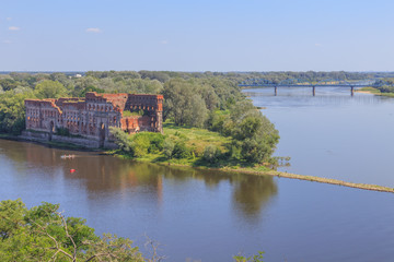 Ruins of granary - Modlin Fortress (Twierdza Modlin), big 19th century fortresses in Poland. It is located in  Nowy Dwor Mazowiecki, district Modlin on Narew river, 50 kilometres north of Warsaw.  - obrazy, fototapety, plakaty