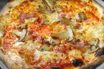 Italy,Naples; pizza with mushrooms.