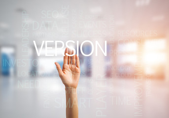 Concept of modern business with palm choocing on of keywords for success