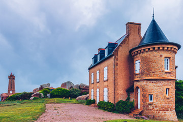 Fototapeta na wymiar Lighthouse of Ploumanach Mean Ruz in Perros-Guirec on Pink Granite Coast, Brittany (Bretagne), France