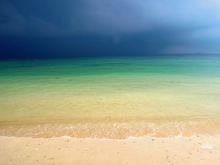 Fototapeta na wymiar Storm color on a beach in Palau Kapas, Malaysia