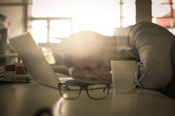 Business man dreaming on office desk. Business man in office.