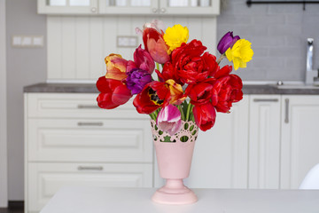 bouquet of red tulips  and narcissus flowers 