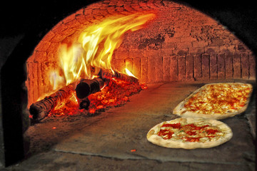Pizzas in wood oven