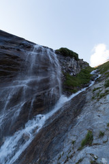 Fototapeta na wymiar Waterfall on the way to Grossglockner, Austria