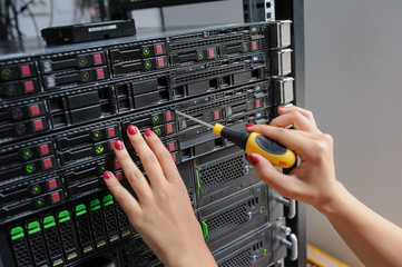 Technician it woman fixing the problem