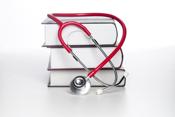 Concept of medical education with book and stethoscope