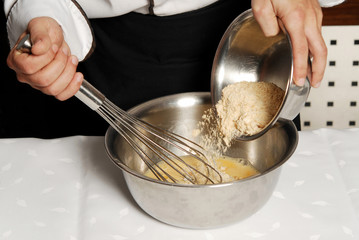 Male chef preparing food in the kitchen