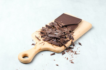 Chopped chocolate on cutting board