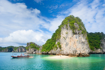 Beautiful scenery with an island and a wild beach in the archipelago Cat Ba, Vietnam. © soft_light