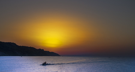 Fototapeta na wymiar Sunset by the sea
