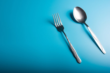 Raw Rice on bowl in blue background