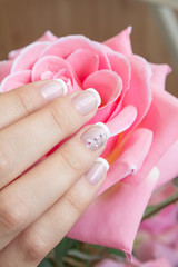 Lacquer on the nails of the hands. Fresh French manicure