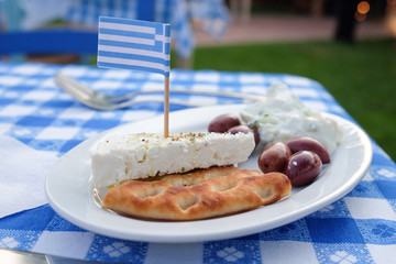 Traditional Greek Meze with Olives, Tzatziki, cheese and bread