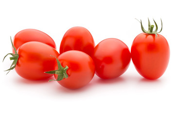 Small plum tomatoes on a white background.